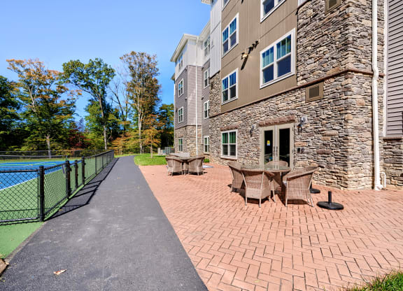 the preserve at ballantyne commons apartment patio and tennis court