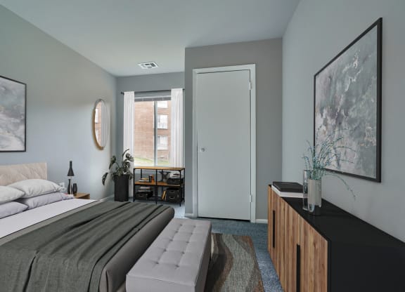 a bedroom with a bed and a dresser and a window