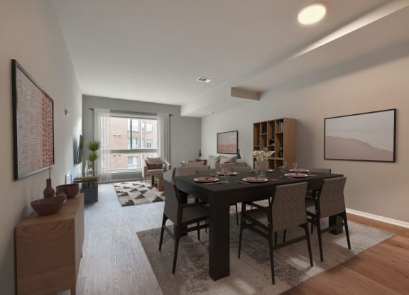 an open living room and dining room with a black table and chairs