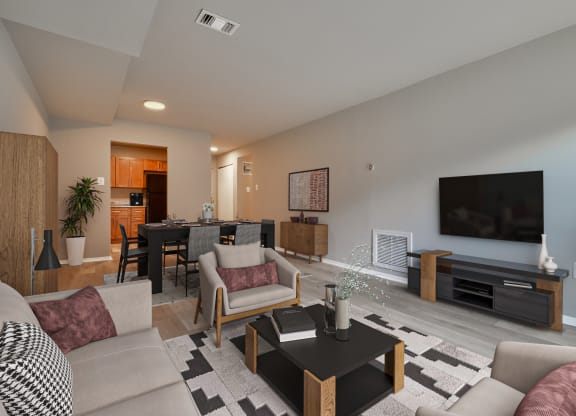 a living room and dining room with a couch and a tv