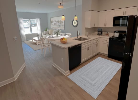 a kitchen and living room in an apartment