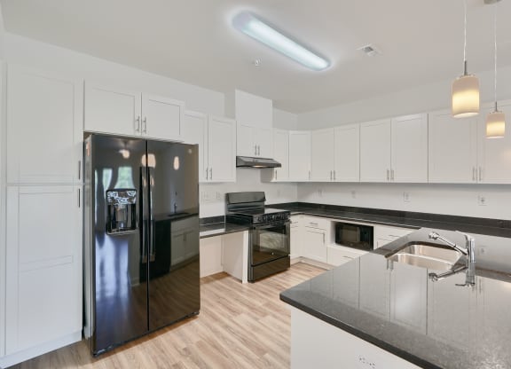 unit 103 kitchen with black energy star appliances
