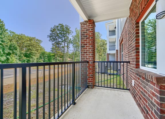 the preserve at ballantyne commons apartment balcony and brick building
