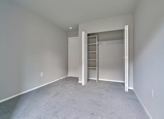 bedroom with storage in closet