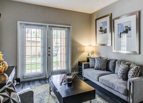 a living room with a couch and a coffee table