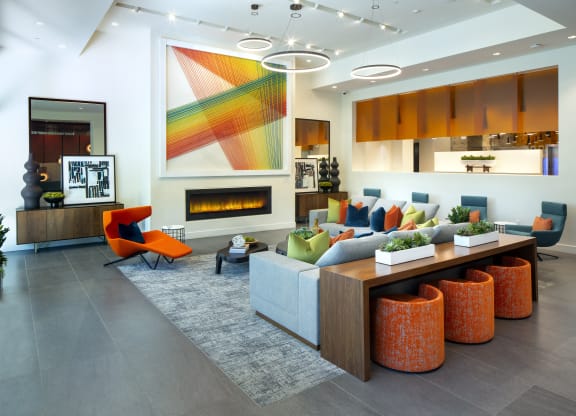 Woodland Hills Luxury Apartments - The Q Variel - Lobby with Various Comfortable Seating Options, Luxury Finishes, and a Fireplace