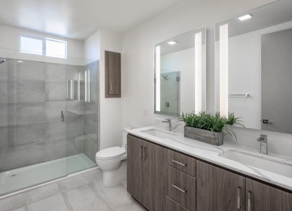 the preserve at ballantyne commons bathroom with toilet sink and shower