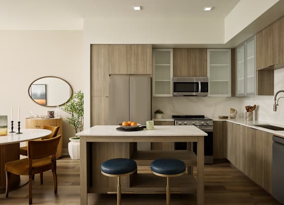 A modern kitchen with a dining table and chairs.