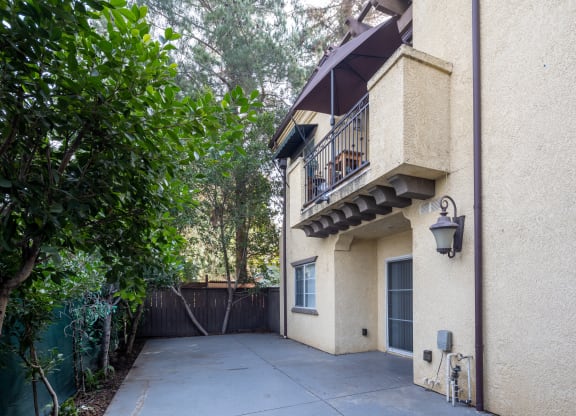 a view of the back of the house from the driveway at The Village Apartments, Van Nuys, CA