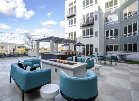 Circa Central large patio with blue chairs and a fire pit at Circa Central Avenue, Phoenix, AZ