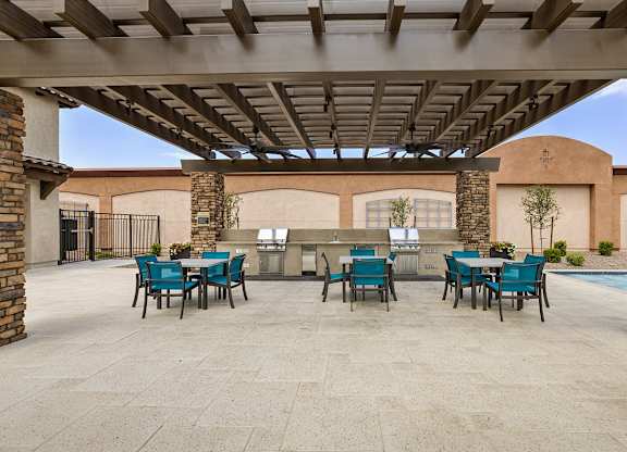 Outdoor BBQ Grill with Intimate Seating Area at Pillar Lago