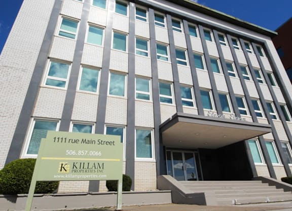 A building with a sign that says Killam Properties.