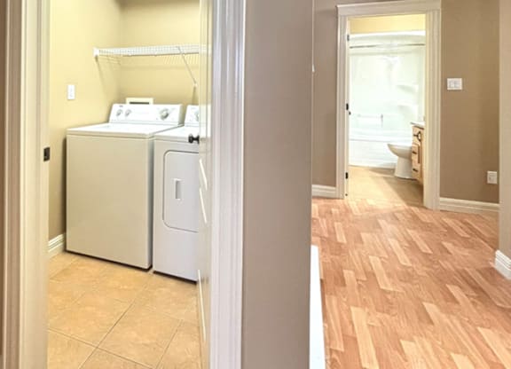 A laundry room with a washer and dryer.