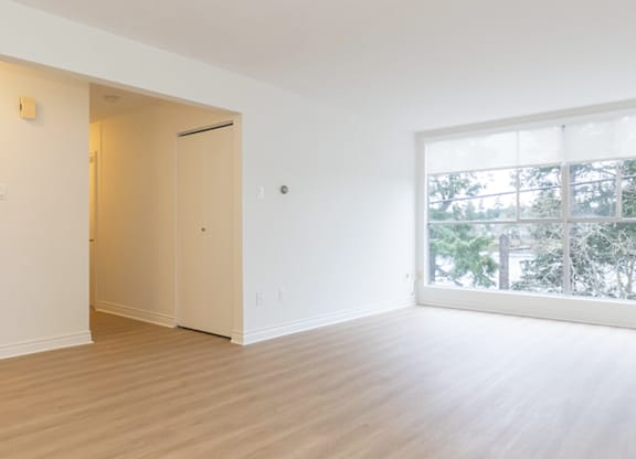 A room with a door and a window.