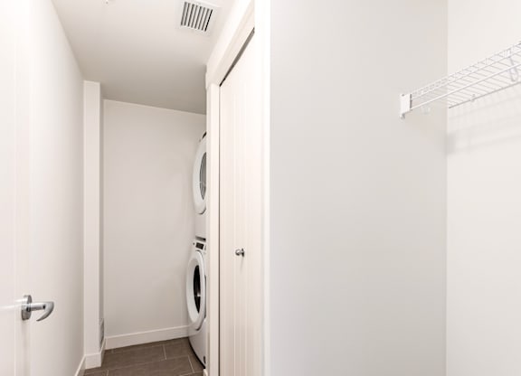 A laundry room with a washer and dryer.