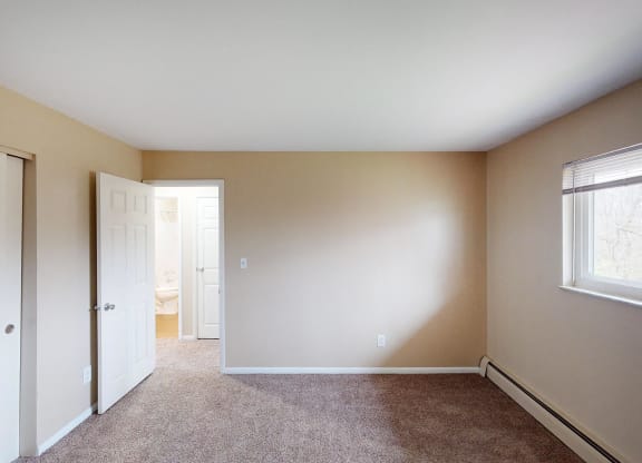 Bedroom with window light at Sharondale Woods Apartments, Cincinnati, 45241