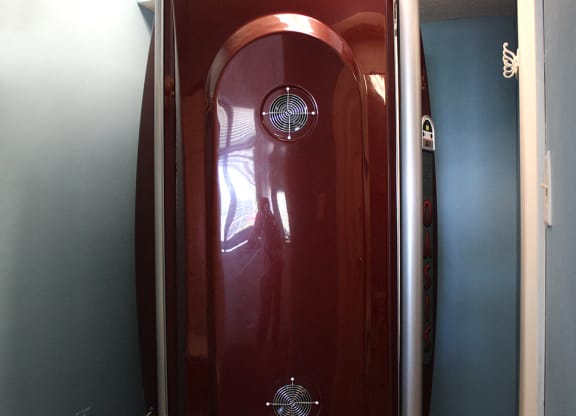 a red door with a reflection of a person in it  at Hunter's Creek Apartments, Cincinnati, OH