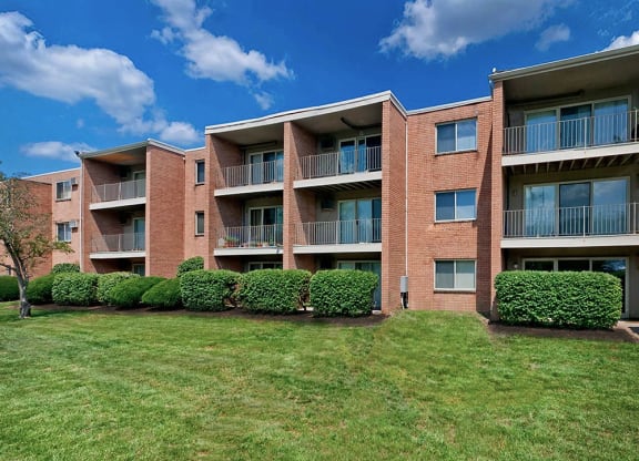Building surrounded by greenery at Crown Pointe Apartments, Kentucky