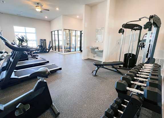 Gym with Elliptical Machines at Hebron Station Apartments, Hebron, KY