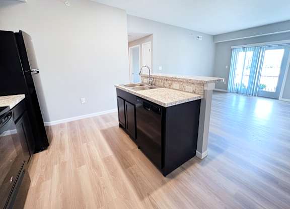 Kitchen with Wooden Floor at Hebron Station Apartments, Hebron, KY