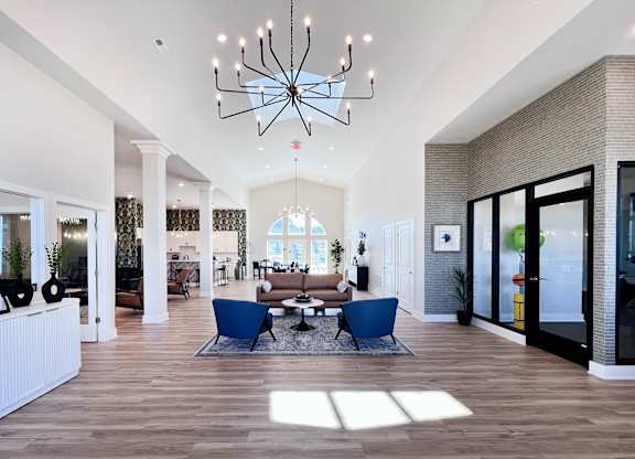 Clubhouse with a Chandelier at Hebron Station Apartments, Hebron