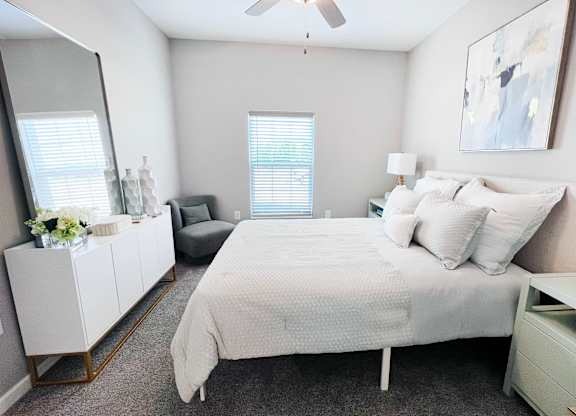 Bedroom with a Mirror at Hebron Station Apartments, Kentucky, 41048