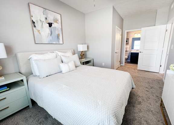 Bedroom with a Large Bed at Hebron Station Apartments, Hebron