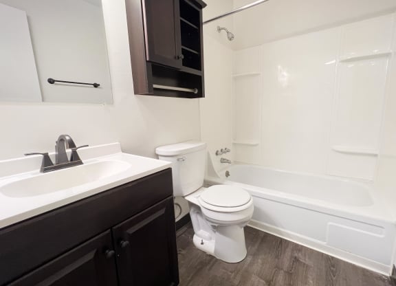 an empty bathroom with a sink toilet and bath tub at Crown Pointe Apartments, Kentucky, 41014