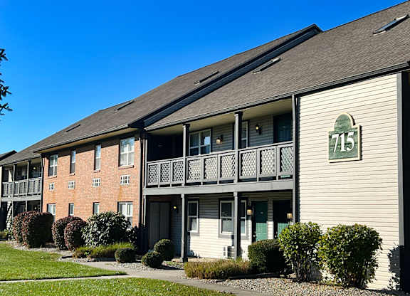 Apartment building with the number 715 on the front.