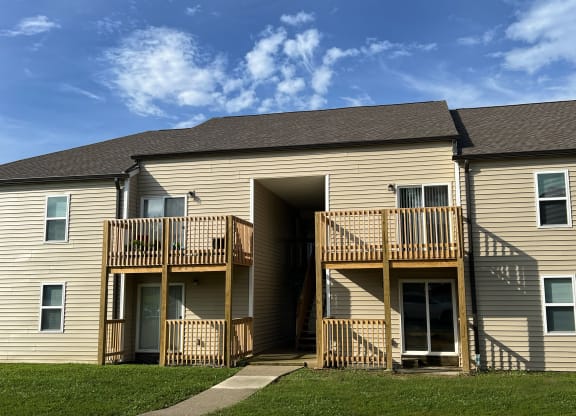 the back of a building with two decks and a blue sky at 450 on Keeneland Apartments, Kentucky, 40475