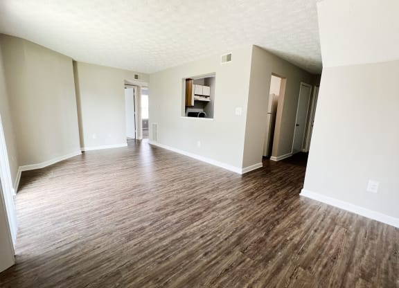 Room with wooden floors and white walls at 450 on Keeneland Apartments, Richmond, KY 40475