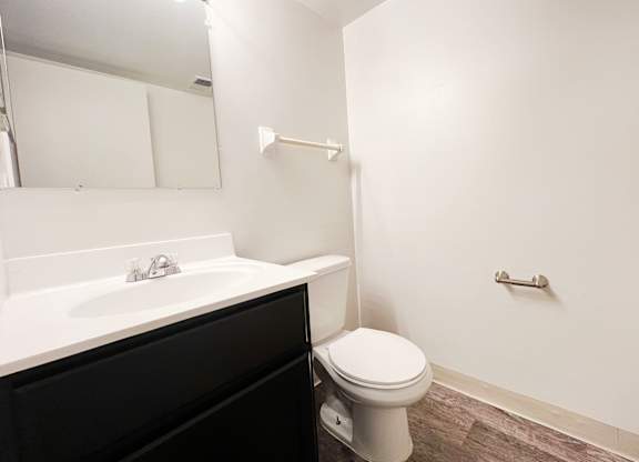 an empty bathroom with a toilet and a sink at Indian Lookout Apartments, Cincinnati, OH, 45238
