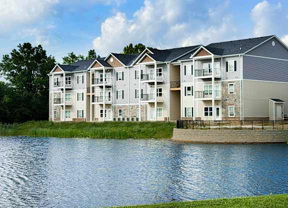 Waterfront apartment community with balconies and pond at The Meridian on 32 Apartments, Batavia, 45103