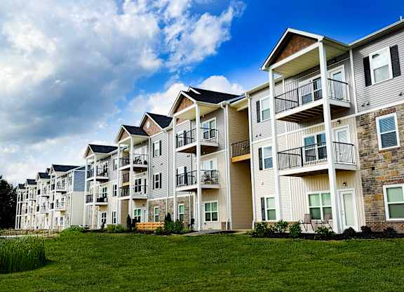 Multi story apartment buildings with covered balconies at The Meridian on 32 Apartments, Ohio
