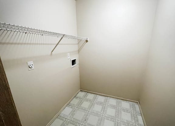 an empty room with a closet and a wire rack at Eagle Crest Apartments, Ohio