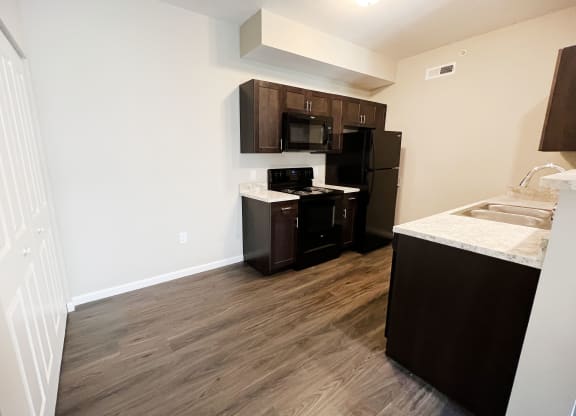 Kitchen with cabinets at Parkway Trails, Florence