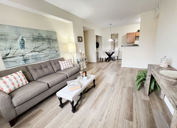 a living room with a couch and a table at Residences at Northgate Crossing, Ohio, 43235