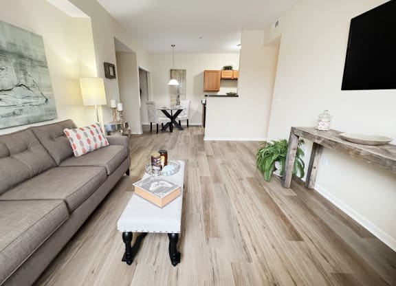 a living room with a couch and a coffee table at Residences at Northgate Crossing, Ohio, 43235