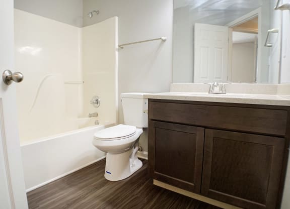 a bathroom with a toilet and a sink  at Aberdine Place, Georgetown, Kentucky