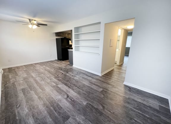 a bedroom with hardwood floors and white walls at Wentworth Estates Apartments, Florence, KY