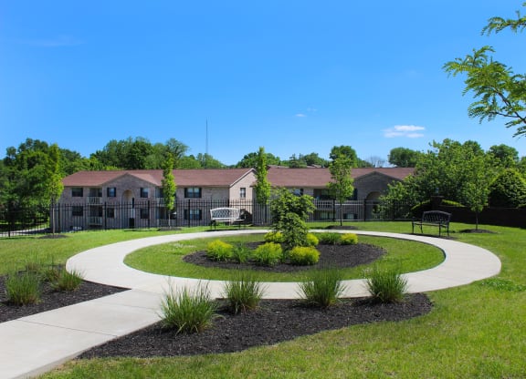 a park with a pathway and a building in the background  at Four Worlds Apartments, Ohio, 45231