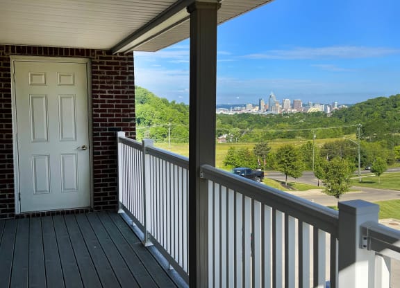 a balcony with a door and a view of a city  at The Overlook at Ft. Thomas, Ft. Thomas, KY