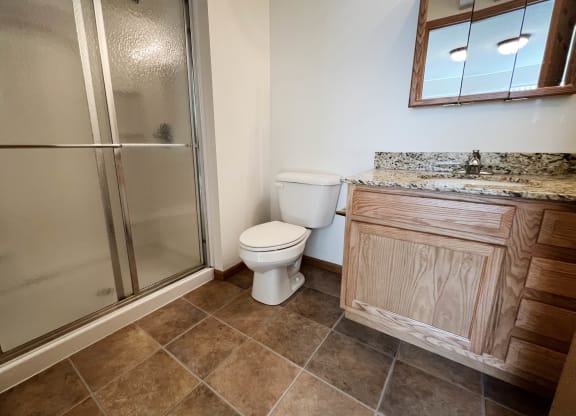 a bathroom with a toilet sink and shower  at The Overlook at Ft. Thomas, Ft. Thomas, Kentucky