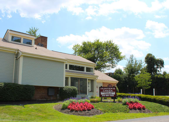 a house with a sign in front of it  at Hunter's Creek Apartments, Ohio, 45242