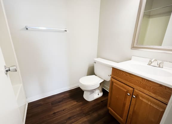 a bathroom with a toilet sink and mirror at 450 on Keeneland, Richmond, 40475