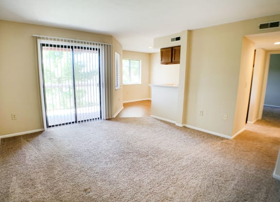 Living room with balcony at Deercross Apartments, Ohio, 45236