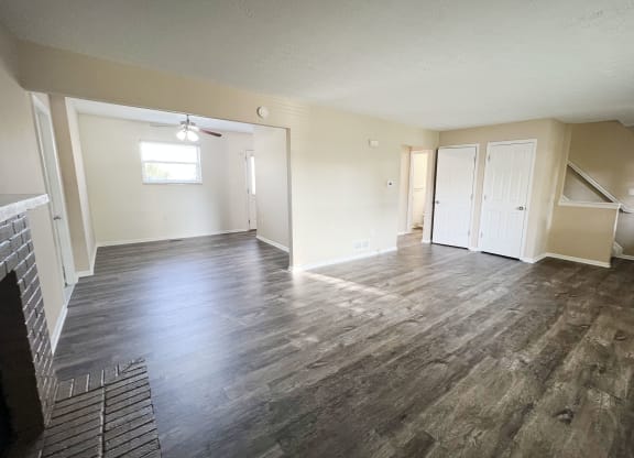 an empty living room with a hard wood floor  at The Villas at Kingswood, West Chester, OH