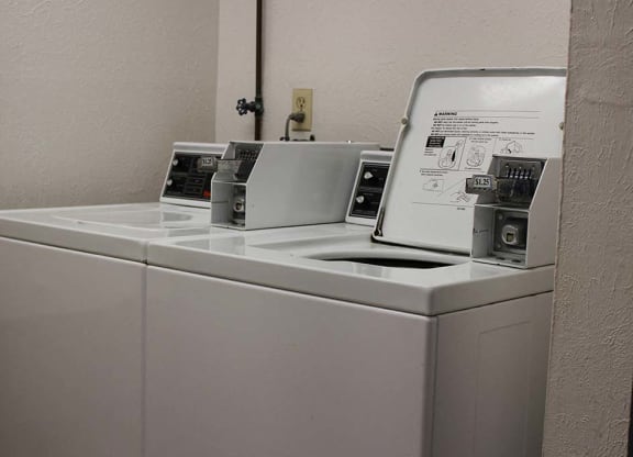 a washer and dryer sitting next to each other at Hunter Ridge Apartments, Cincinnati