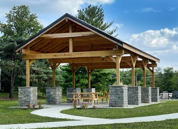 a pavilion with stone pillars in a park at Deercross Apartments, Cincinnati, OH 45236