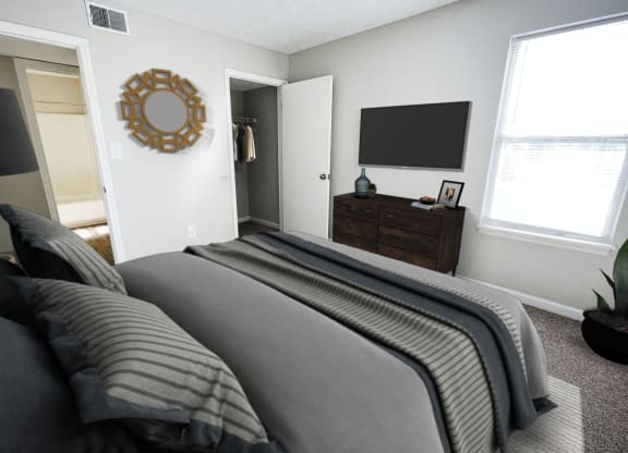 a bedroom with a bed and a dresser at 450 on Keeneland, Richmond